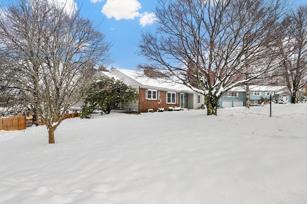 43 Montview Road Chelmsford, MA 01824 - Photo 2 of 40 a view of house with snow and a yard