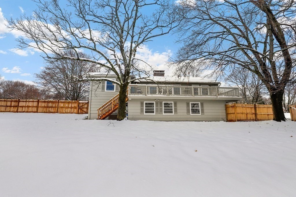 43 Montview Road Chelmsford, MA 01824 - Photo 32 of 40 front view of house with a yard