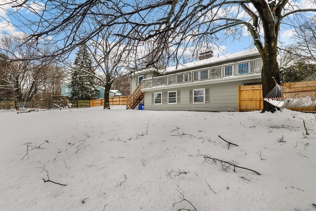 43 Montview Road Chelmsford, MA 01824 - Photo 33 of 40 a front view of house with yard covered in snow