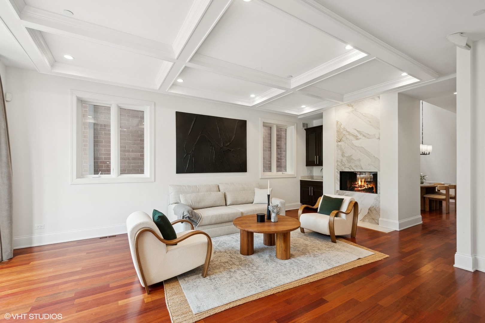 1759 West Surf Street Chicago, IL 60657 - Photo 3 of 43 a living room with furniture fireplace and a flat screen tv