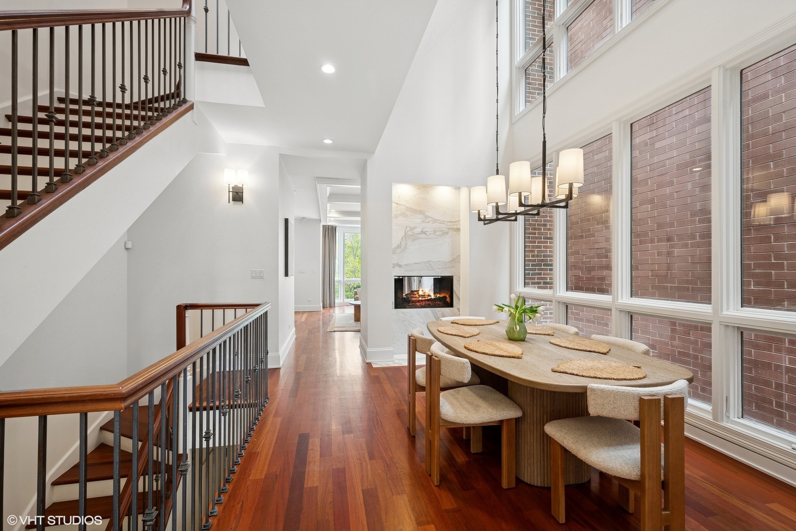 1759 West Surf Street Chicago, IL 60657 - Photo 5 of 43 a view of a a dining room with furniture window and wooden floor
