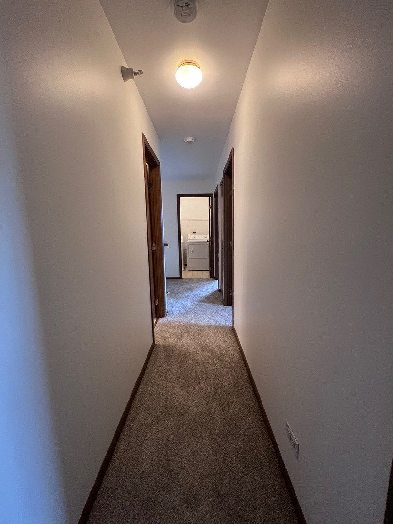 1350 Orleans Drive, Unit 1350 Mundelein, IL 60060 - Photo 25 of 26 a view of hallway with a hallway
