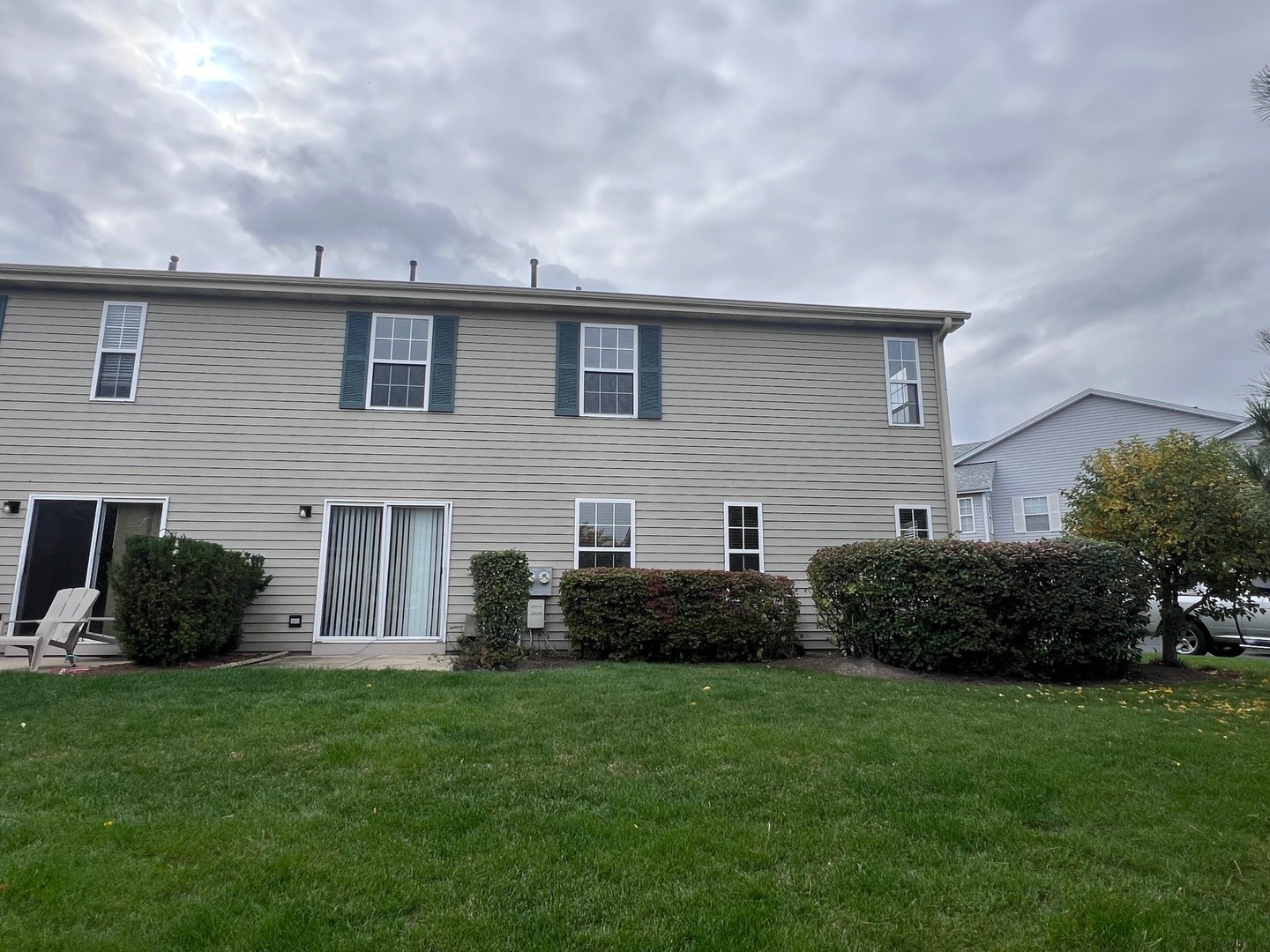 1350 Orleans Drive, Unit 1350 Mundelein, IL 60060 - Photo 3 of 26 a view of a house with backyard and garden