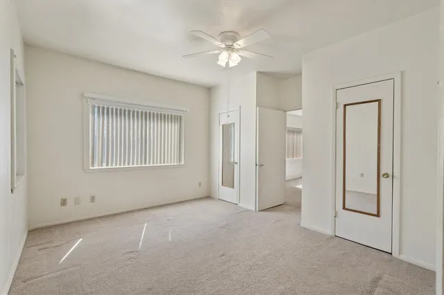 a bathroom with a shower and a toilet
