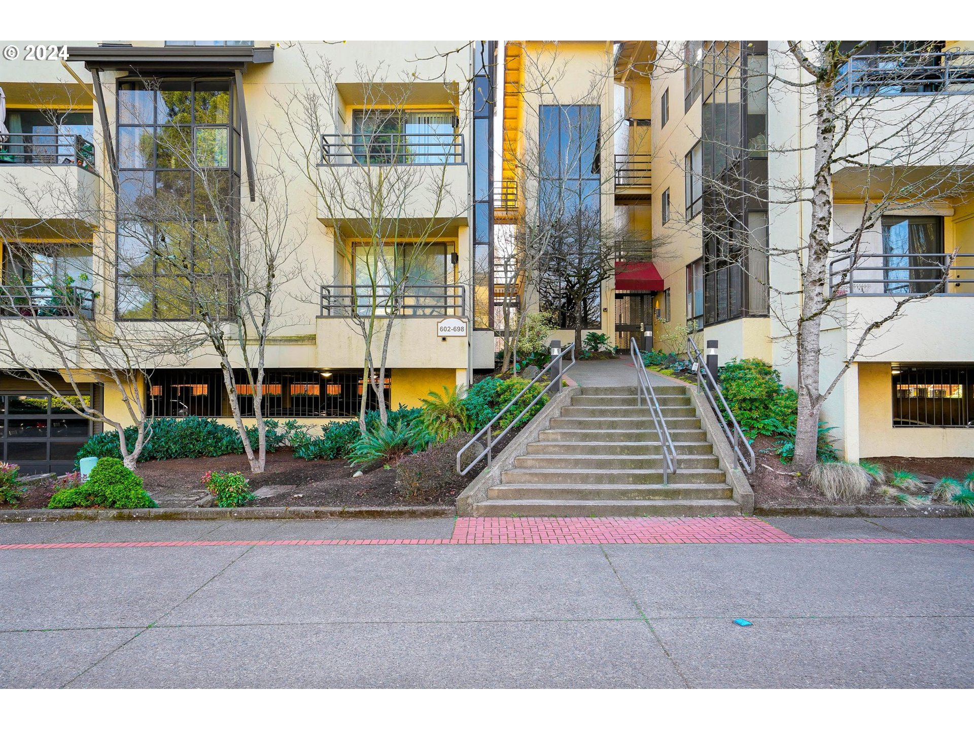 a city street lined with tall buildings