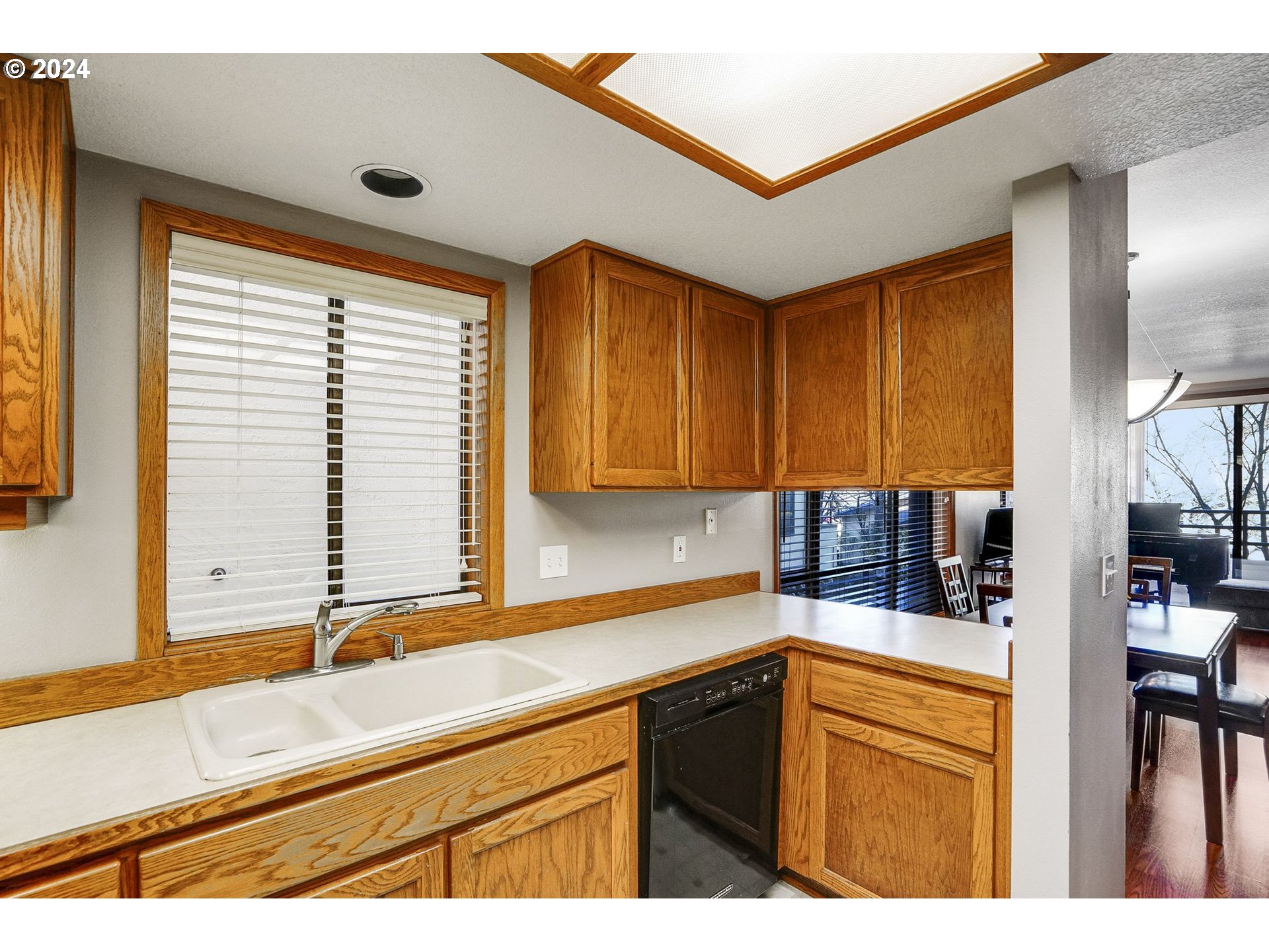 652 Wimbledon Court Eugene, OR 97401 - Photo 12 of 35 a kitchen with stainless steel appliances granite countertop a sink and a cabinets