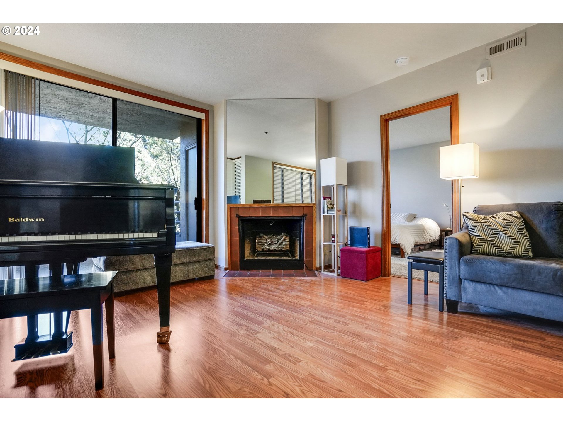 652 Wimbledon Court Eugene, OR 97401 - Photo 7 of 35 a living room with furniture and a fireplace