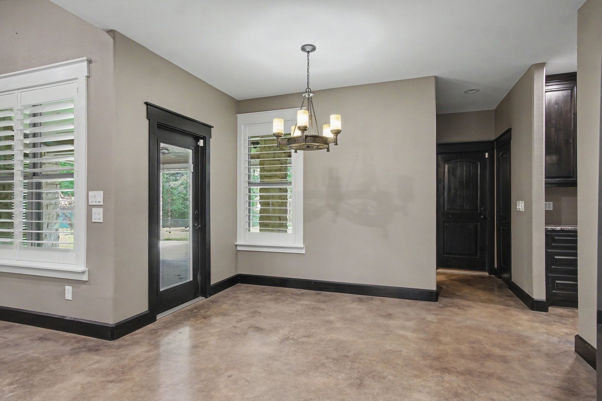 184 Bridgepoint Onalaska, TX 77360 - Photo 13 of 41 an empty room with windows and entrance