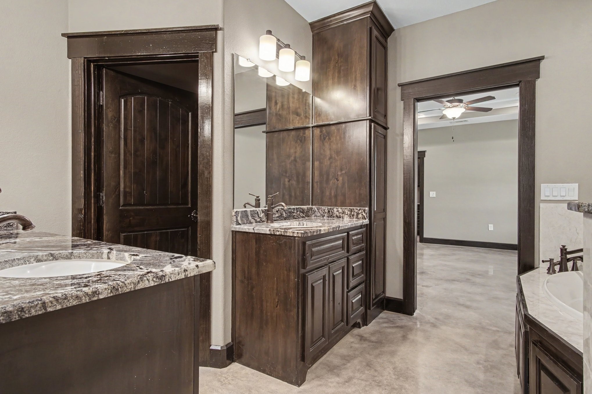 184 Bridgepoint Onalaska, TX 77360 - Photo 16 of 41 a bathroom with a granite countertop sink and a mirror