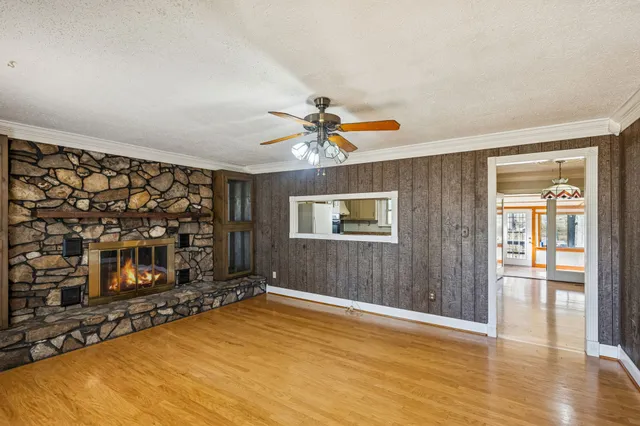 a view of livingroom with window and fireplace