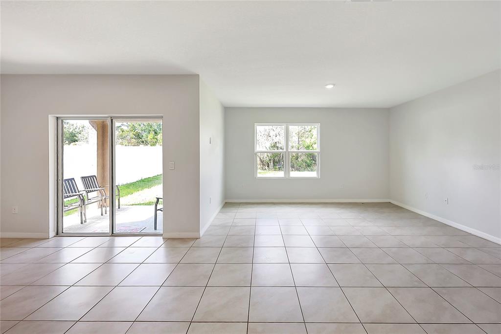 2726 Harmonia Hammock Road Harmony, FL 34773 - Photo 12 of 18 an empty room with windows