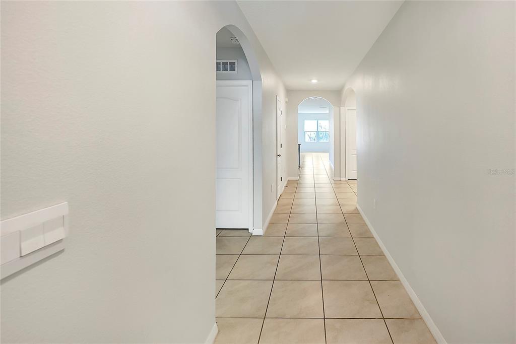2726 Harmonia Hammock Road Harmony, FL 34773 - Photo 3 of 18 a view of a hallway
