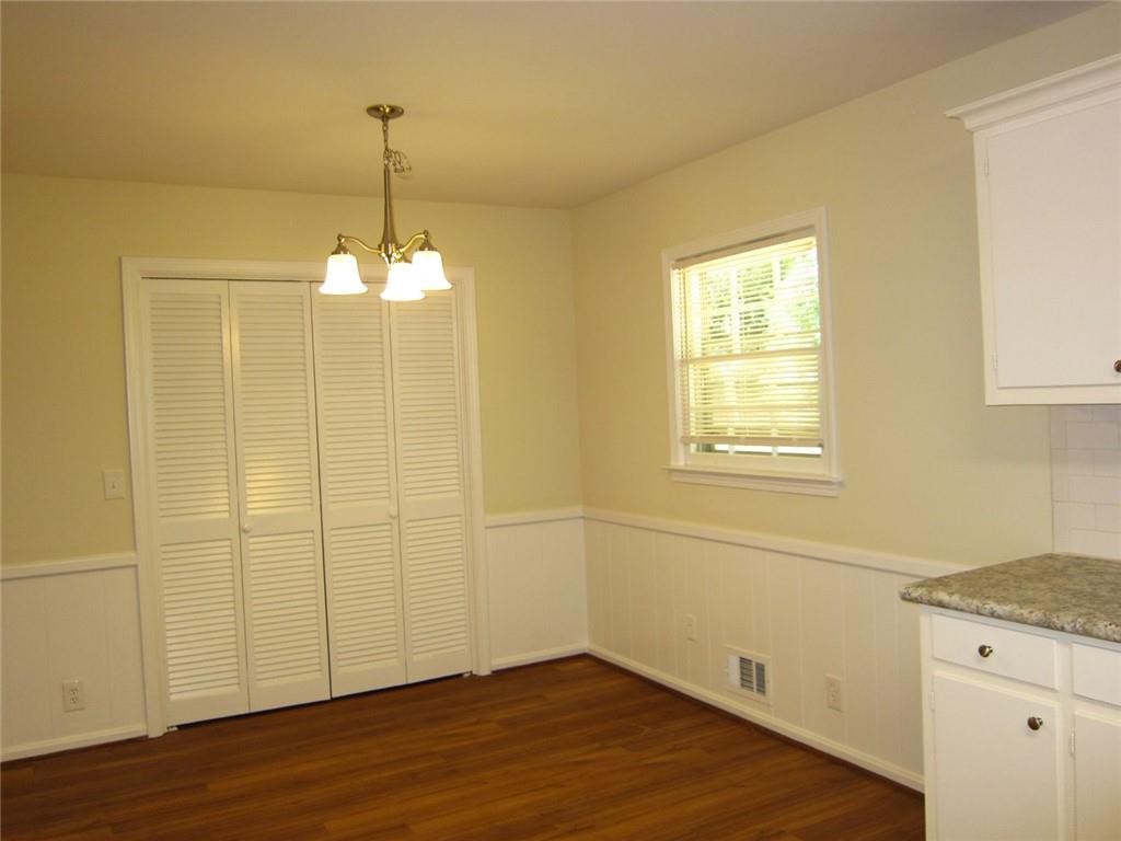 1740 Samaria Trail Tucker, GA 30084 - Photo 11 of 31 a view of a kitchen with wooden floor and a window