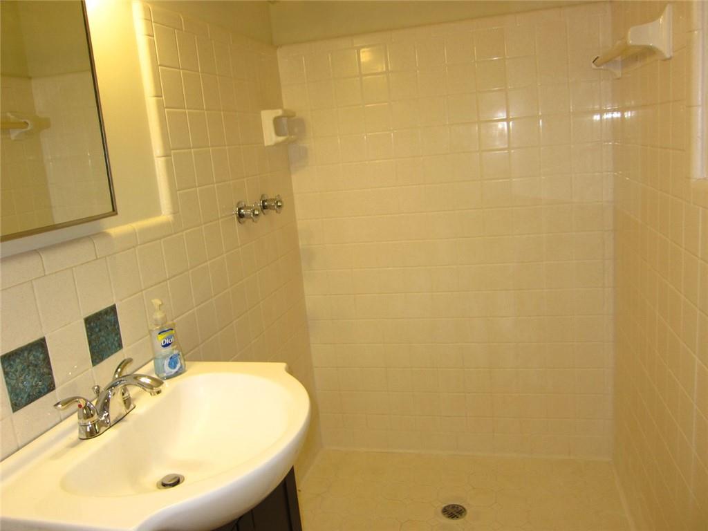 1740 Samaria Trail Tucker, GA 30084 - Photo 24 of 31 a bathroom with a sink and a mirror
