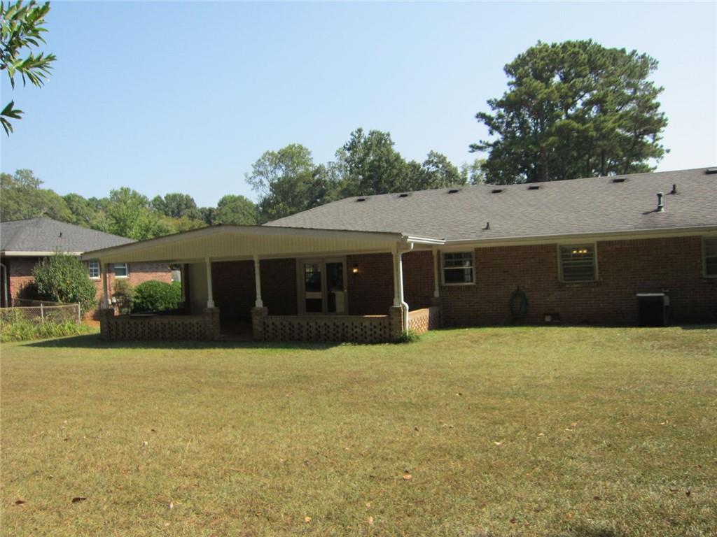1740 Samaria Trail Tucker, GA 30084 - Photo 29 of 31 a front view of a house with a yard and garage