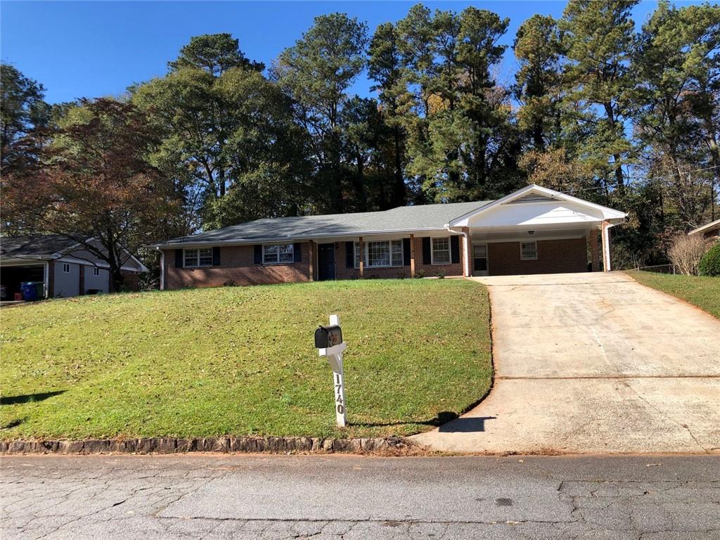 1740 Samaria Trail Tucker, GA 30084 - Photo 31 of 31 front view of a house with a yard