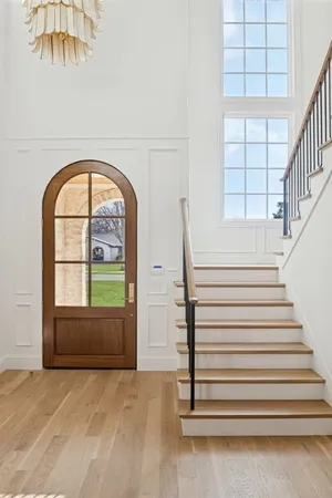 a kitchen with a sink cabinets and window