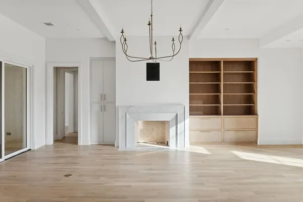 a view of entryway and hall with a front door