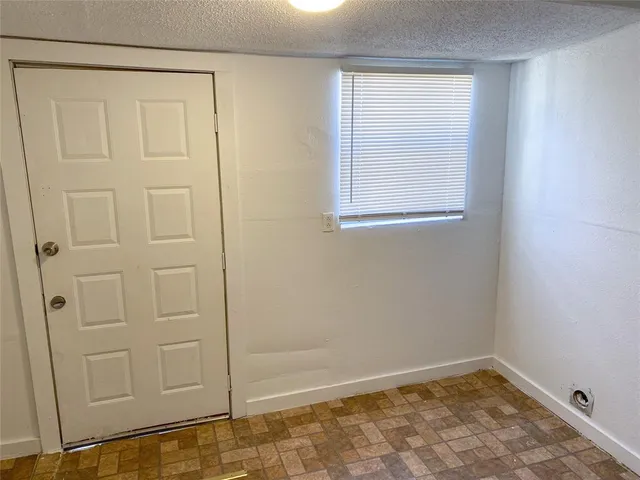 an empty room with cabinet