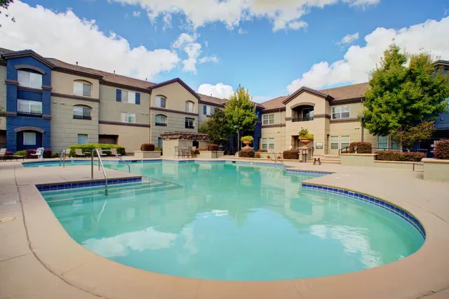 a view of a house with swimming pool