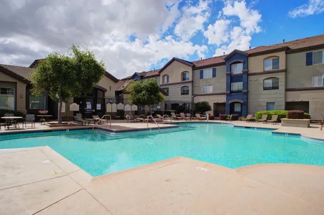 a bedroom with bed and window