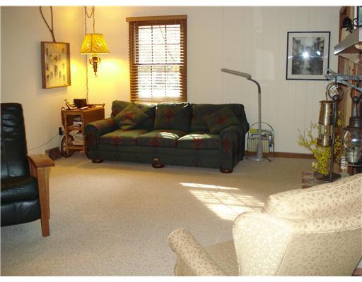217 Highland Road Fox Chapel, PA 15238 - Photo 6 of 18 Family Room. Wet bar, fireplace, access to covered porch