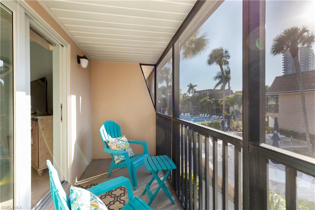87 North Collier Boulevard, Unit J18 Marco Island, FL 34145 - Photo 8 of 21 Western skies from private screened balcony