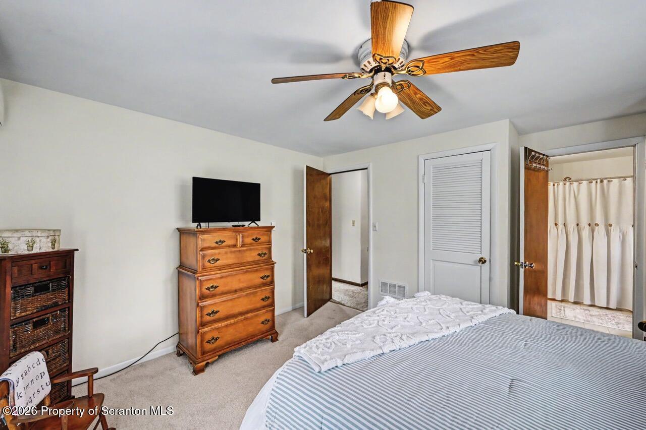 719 Scott Road Clarks Summit, PA 18411 - Photo 27 of 51 a bedroom with a bed and a television