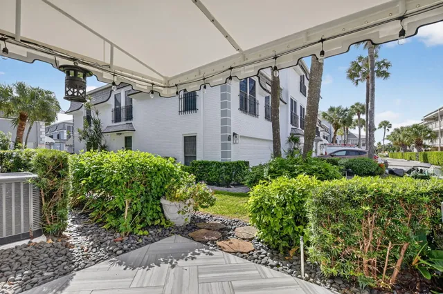 a view of a house with a garden