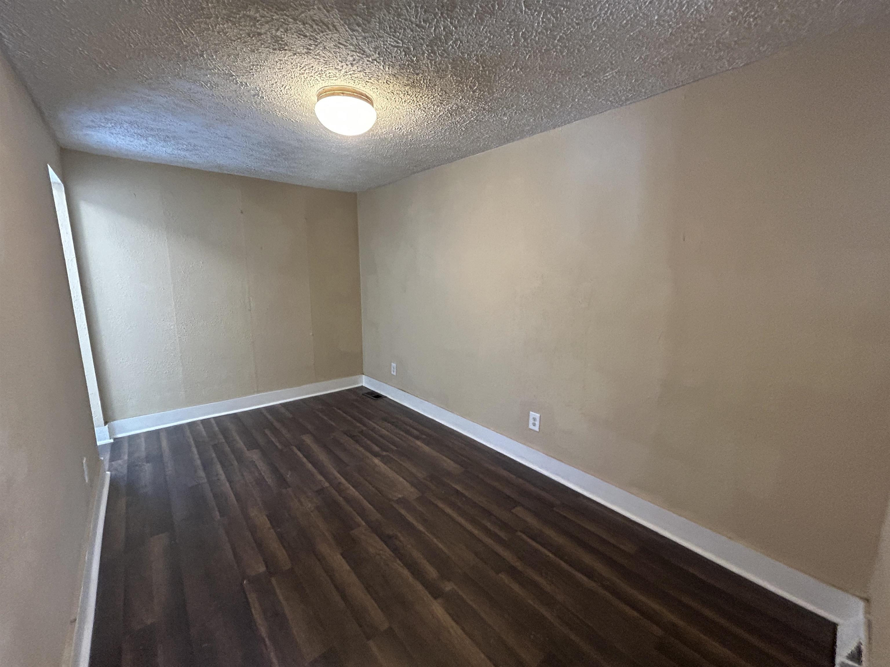 412 Brooke Road Rockford, IL 61109 - Photo 6 of 15 a view of room with wooden floor