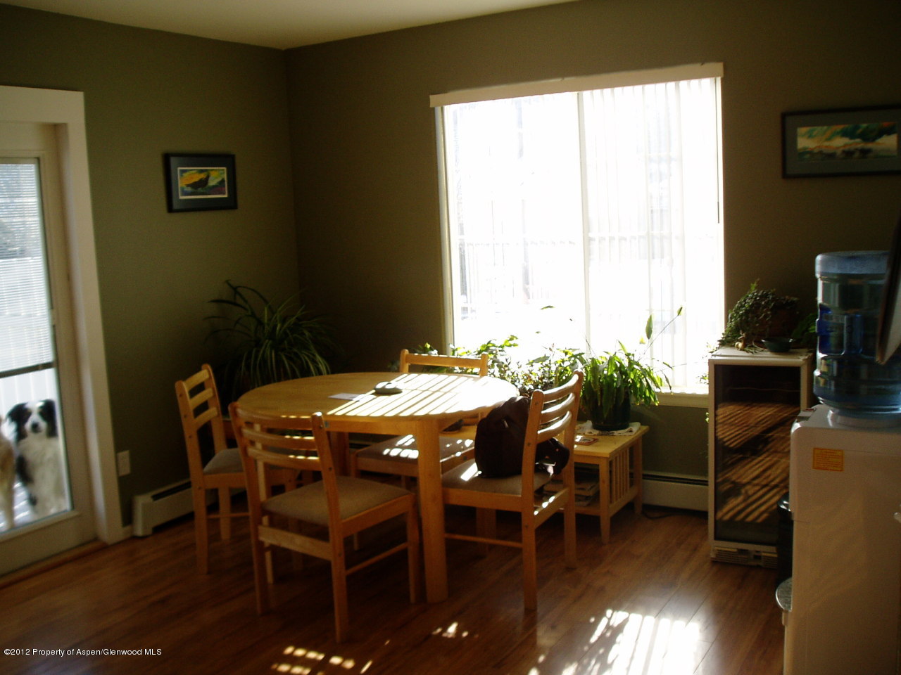 402 Evergreen Drive Rifle, CO 81650 - Photo 4 of 13 a view of a dining room with furniture and wooden floor