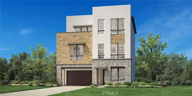 front view of a building with a garden