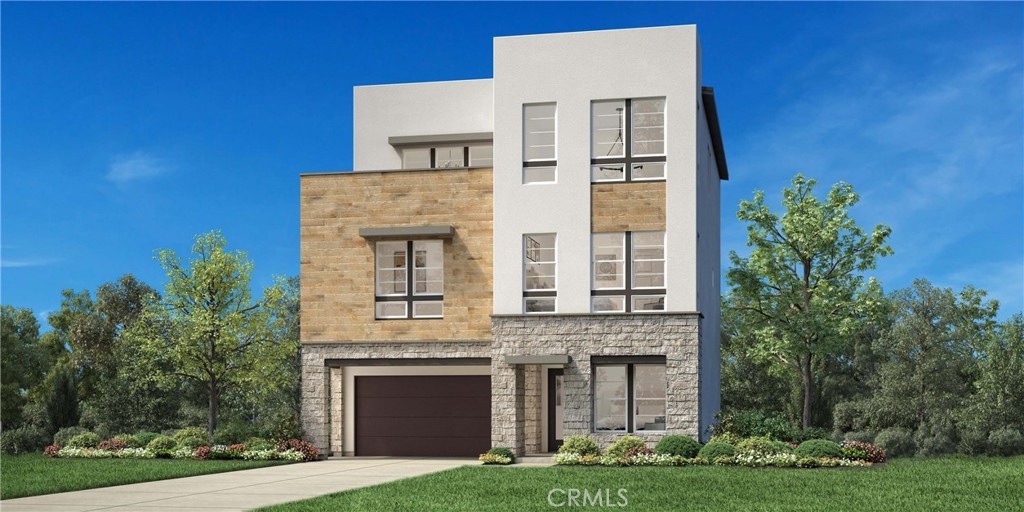 front view of a building with a garden