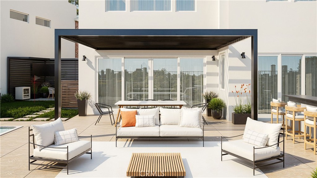 105 Remy Lane Montebello, CA 90640 - Photo 13 of 38 a outdoor living space with patio furniture and a wooden floor