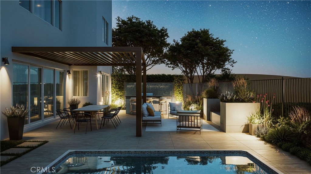 105 Remy Lane Montebello, CA 90640 - Photo 19 of 38 a view of a patio with couches table and chairs and potted plants