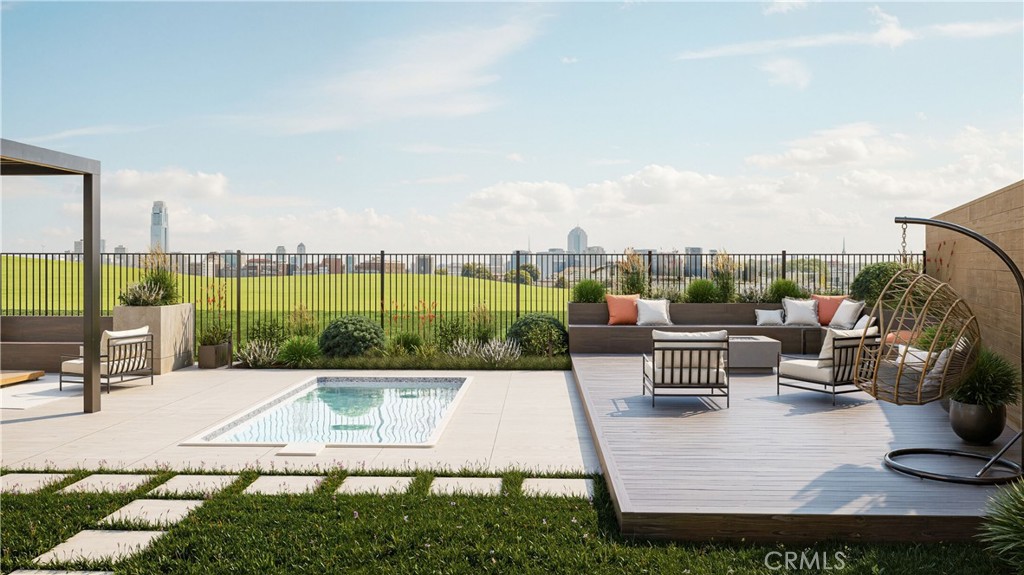 105 Remy Lane Montebello, CA 90640 - Photo 4 of 38 a view of a swimming pool with couches and lounge chairs