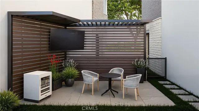 a view of backyard with sitting area