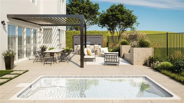 a building outdoor space with patio furniture and potted plants