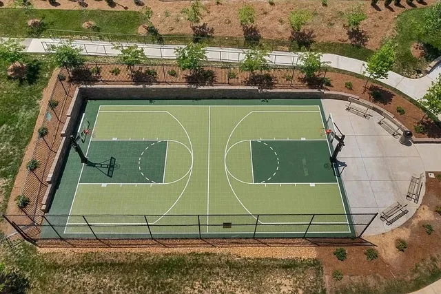 an aerial view of a house with outdoor space