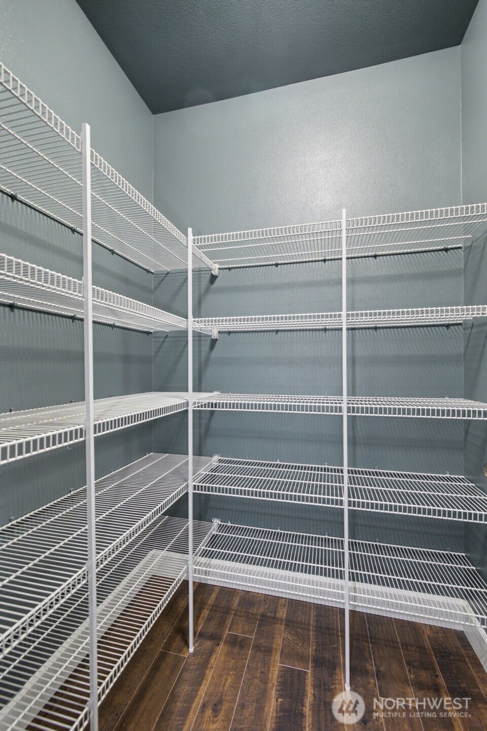 207 Fielding Street Northeast Orting, WA 98360 - Photo 13 of 37 a view of walk in closet with empty racks