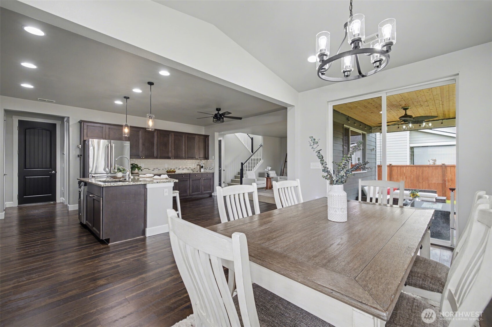 207 Fielding Street Northeast Orting, WA 98360 - Photo 15 of 37 a kitchen with counter space appliances and a chandelier