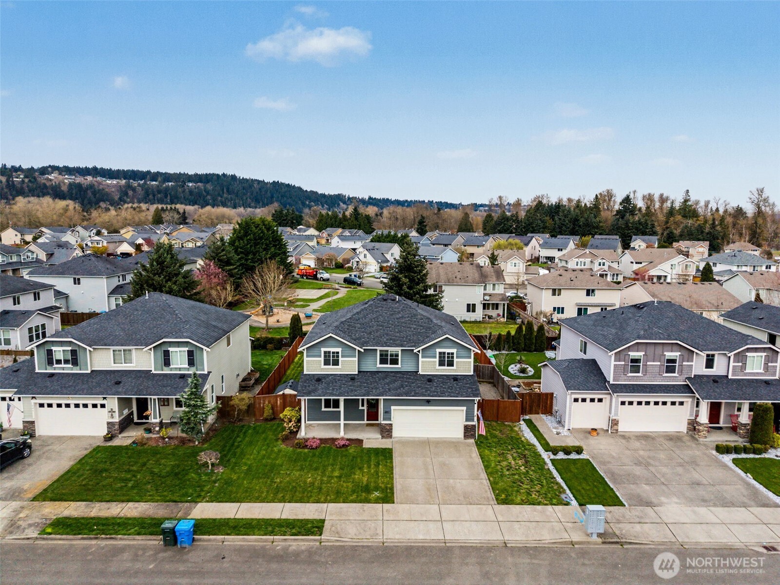 207 Fielding Street Northeast Orting, WA 98360 - Photo 34 of 37 an aerial view of residential houses with city view and lake view
