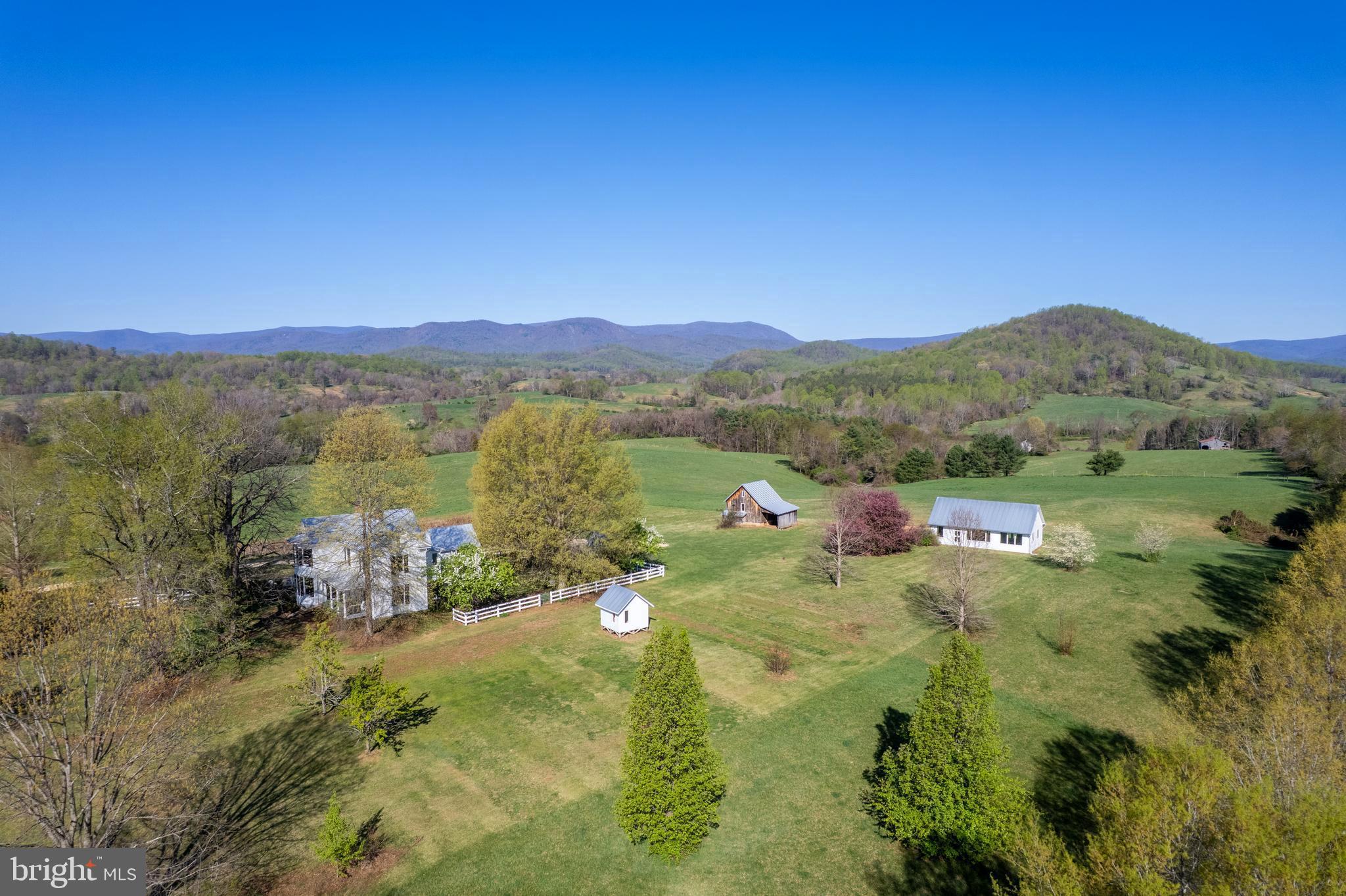 873 Hawlin Road Woodville, VA 22749 - Photo 14 of 45 a view of lake with mountain