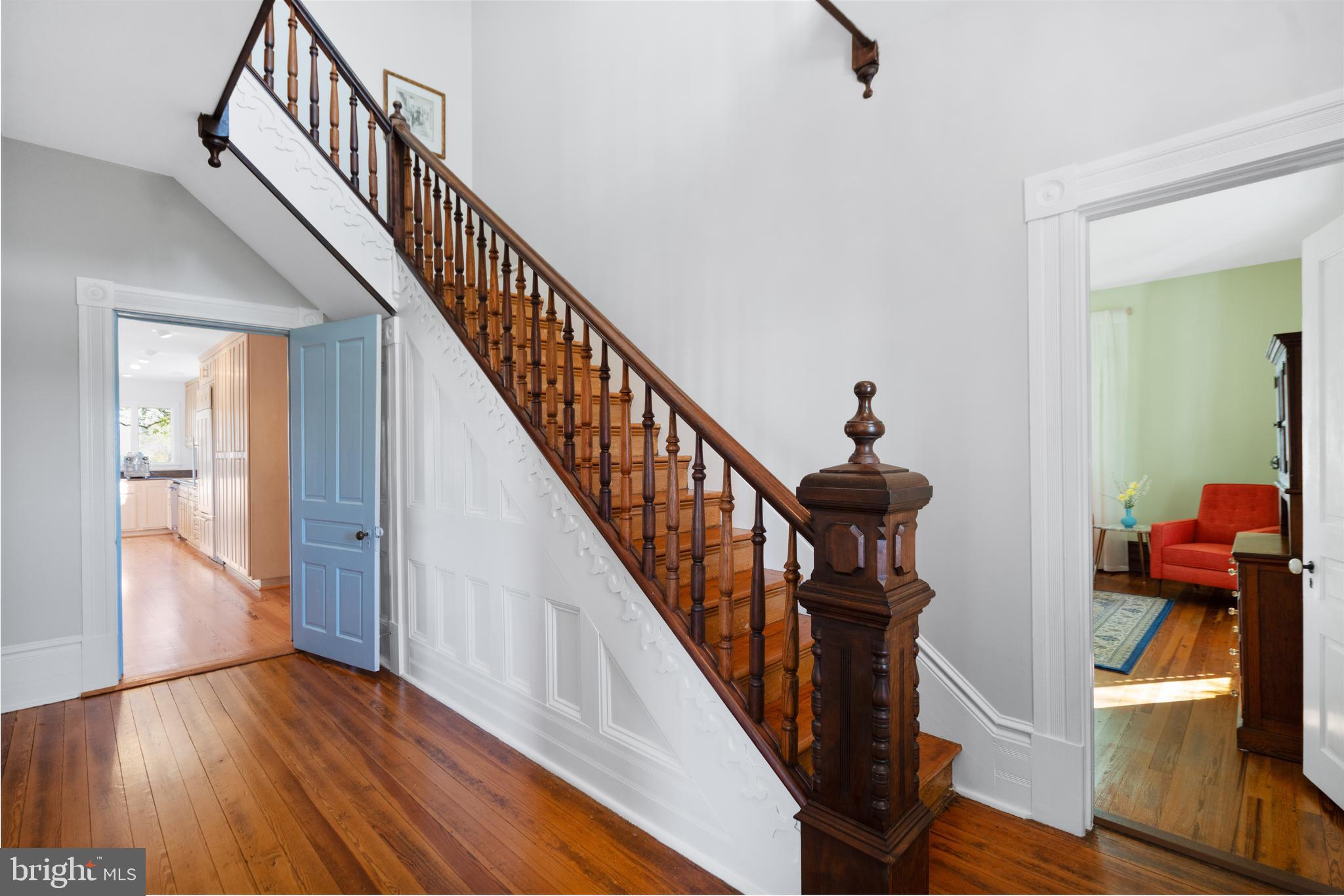 873 Hawlin Road Woodville, VA 22749 - Photo 17 of 45 a view of a hallway with wooden floor and staircase