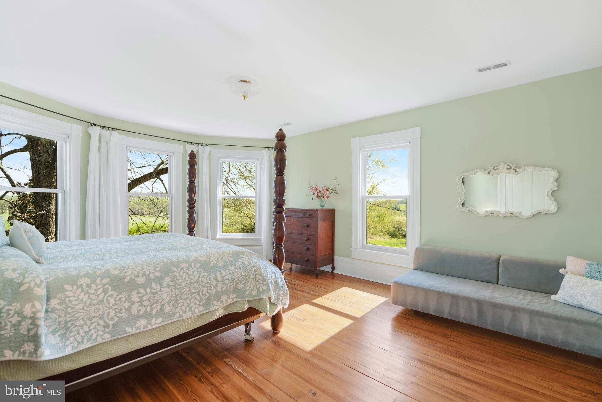 873 Hawlin Road Woodville, VA 22749 - Photo 28 of 45 a bedroom with a bed and window