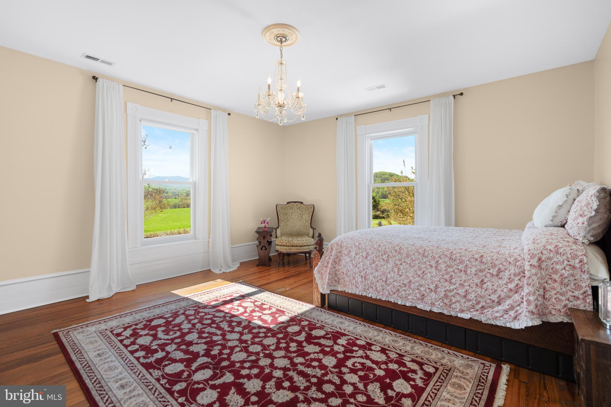 873 Hawlin Road Woodville, VA 22749 - Photo 30 of 45 a bedroom with a bed and a window with yard