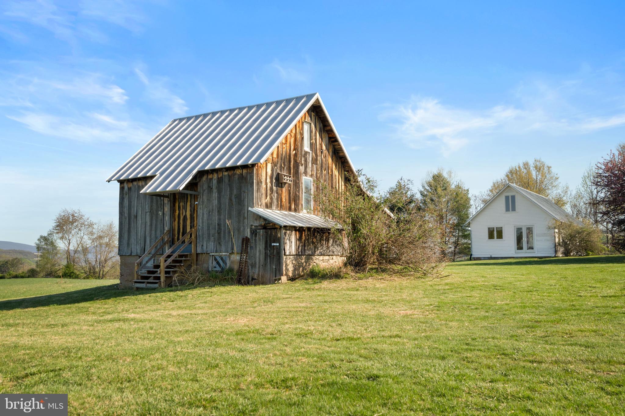 873 Hawlin Road Woodville, VA 22749 - Photo 32 of 45 a front view of a house with a yard