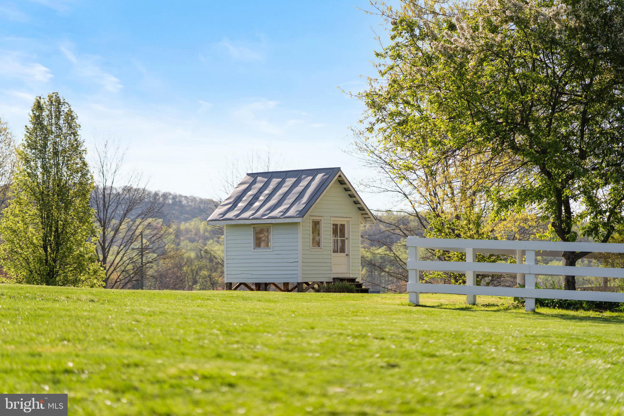 873 Hawlin Road Woodville, VA 22749 - Photo 35 of 45 a front view of house with yard and seating