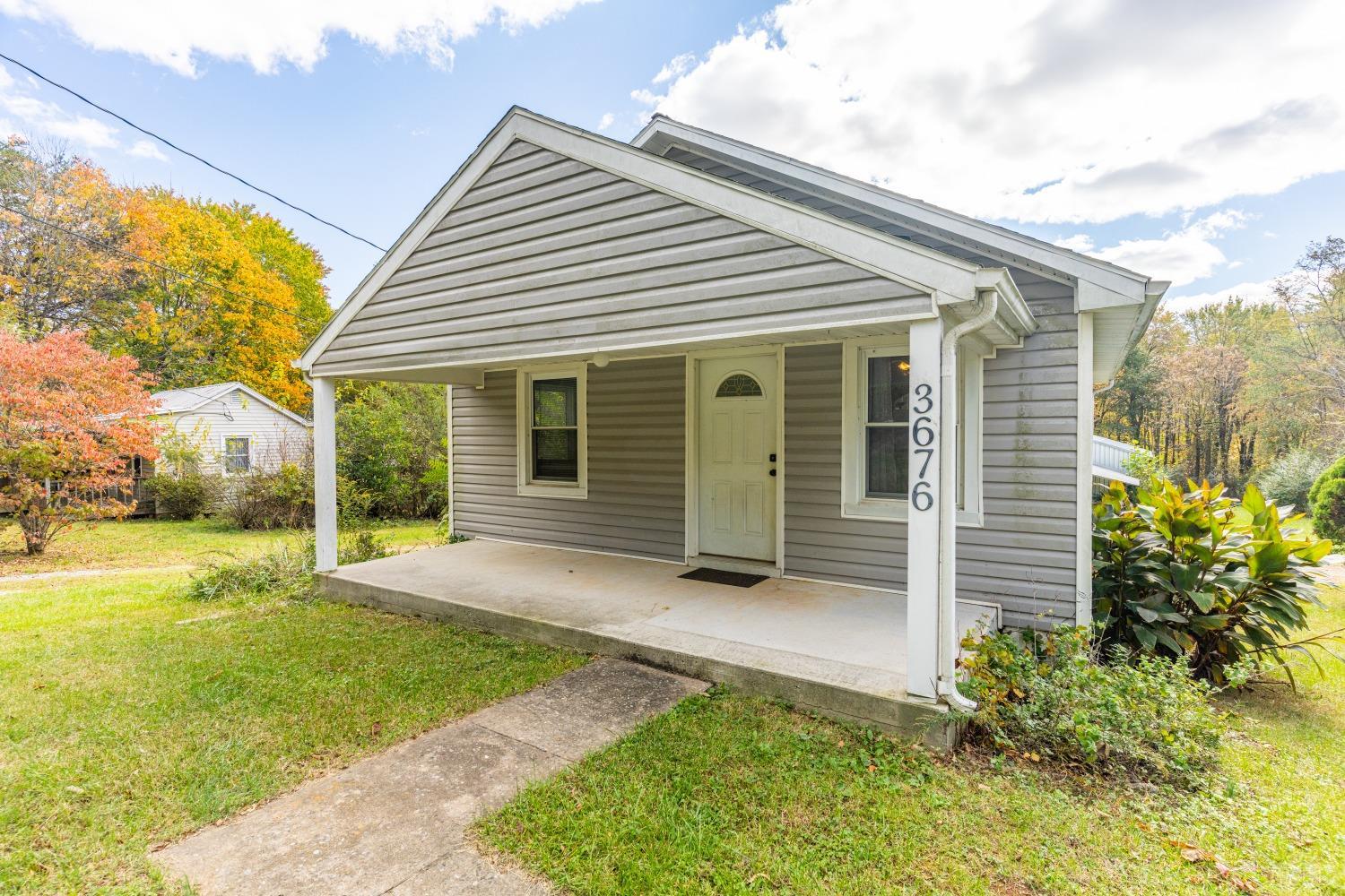 3676 Depot Road Rustburg, VA 24588 - Photo 1 of 37 a view of a house with backyard and garden