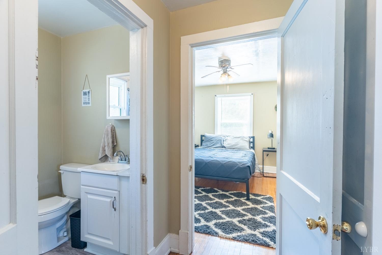 3676 Depot Road Rustburg, VA 24588 - Photo 16 of 37 a bathroom with a sink toilet and vanity